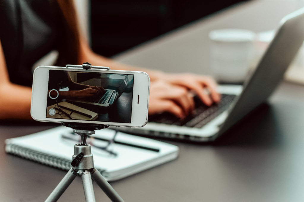 woman making a video