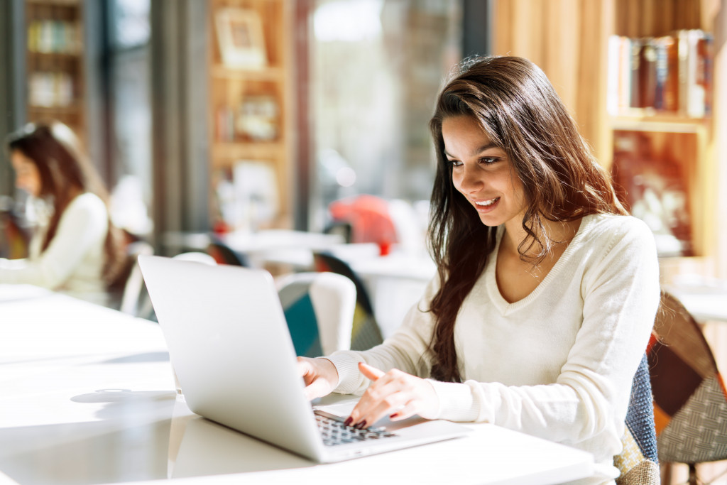 woman using laptop