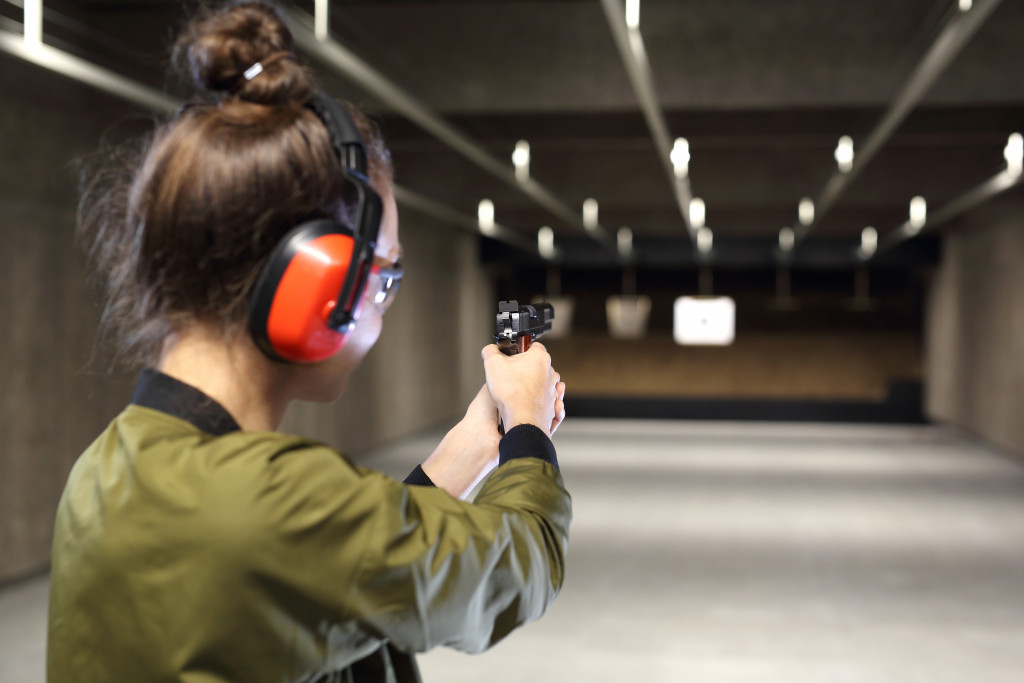 woman shooting targets