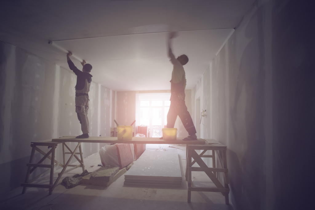 people renovating a house