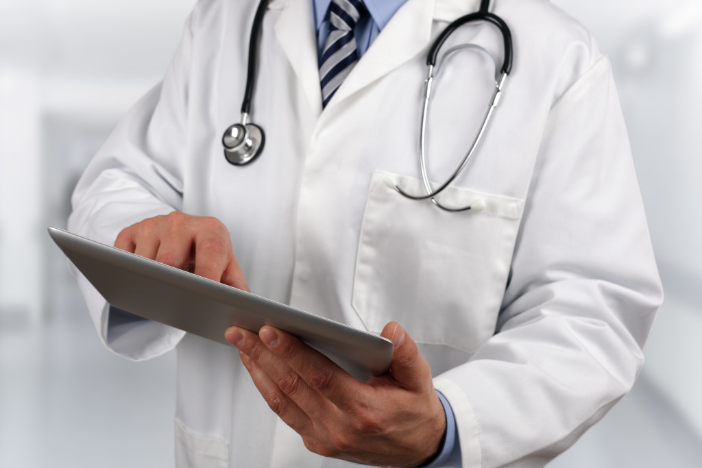doctor using a digital tablet in hospital
