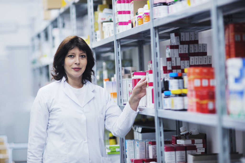 woman in a storage of medical products