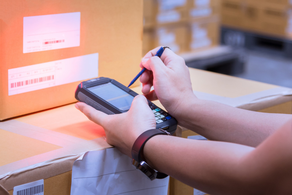 A person scanning a barcode