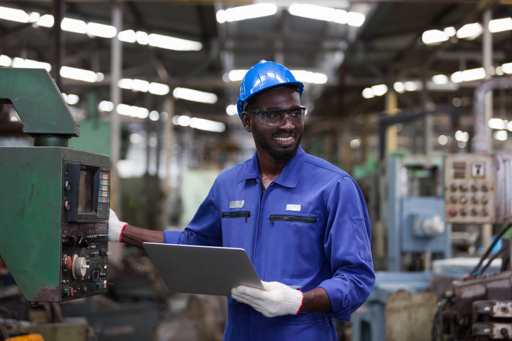 Worker performing maintenance check